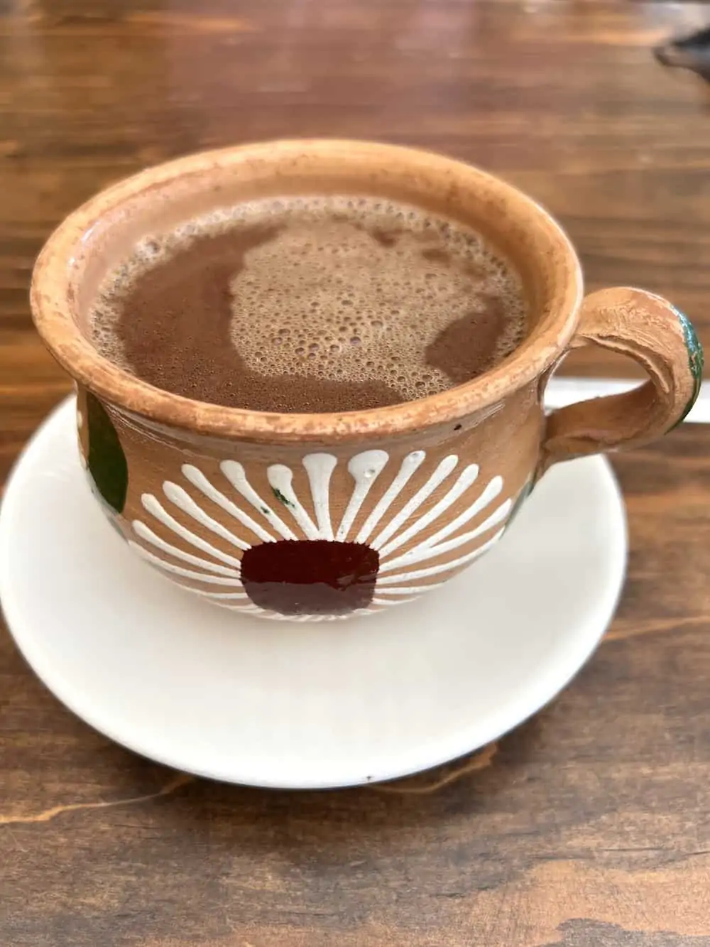 A pottery mug of Oaxacan hot chocolate.