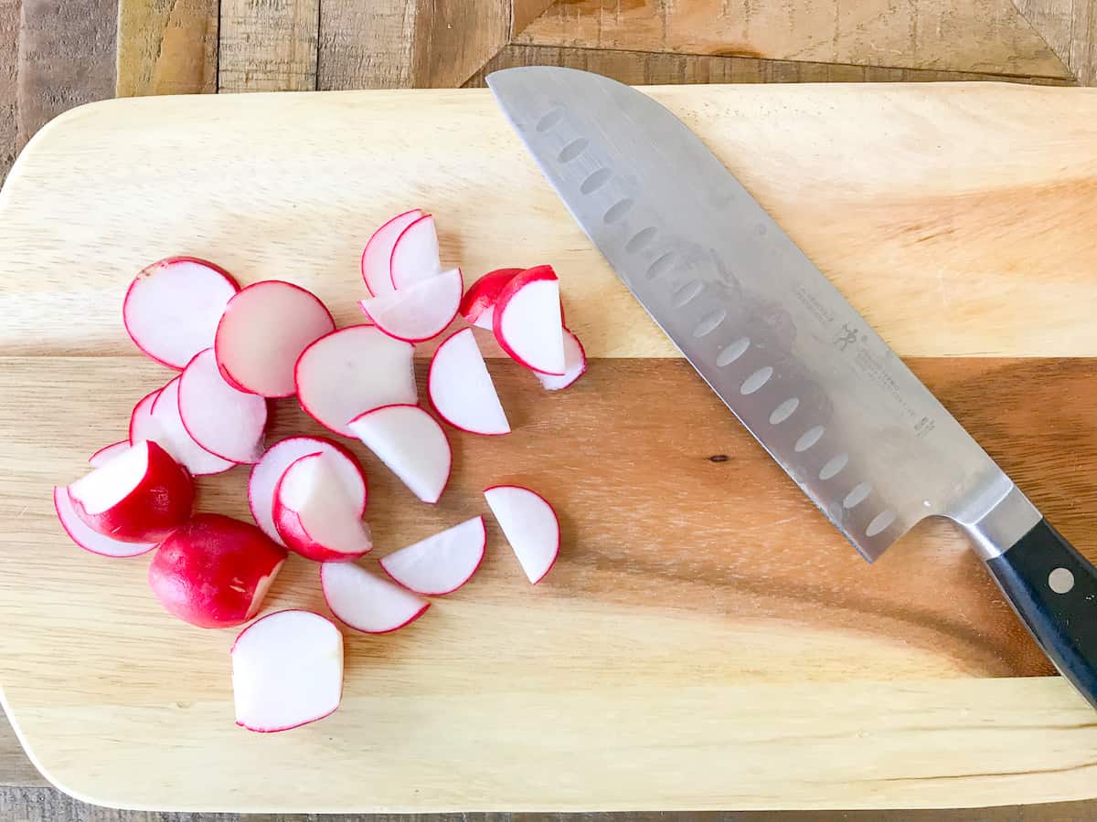 Trim and chop the radishes.