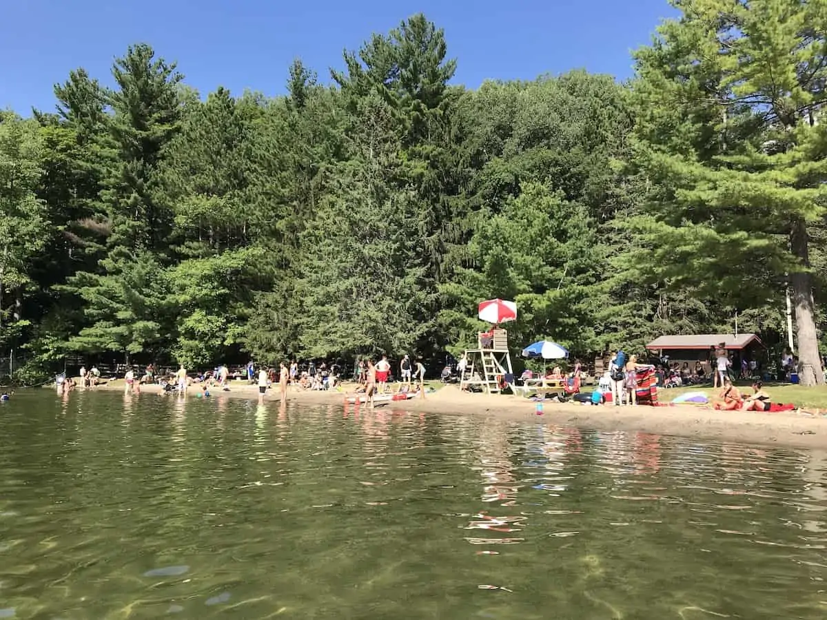 People on a beach in the summer at OBrien Beach.