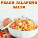 Bowl of peach salsa with Pinterest text overlay.