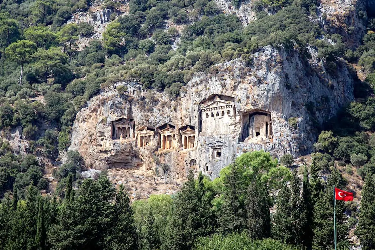 Facades of rock tombs cut from the sheer cliffs in ancient Kaunos.