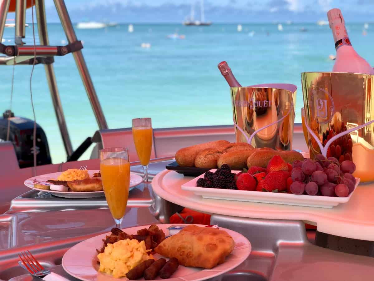Brunch on plates with a view of the ocean
