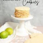 Feature pin for Crispy Lime Coconut Sugar Cookies with a stack of cookies on a white pedestal next to two limes