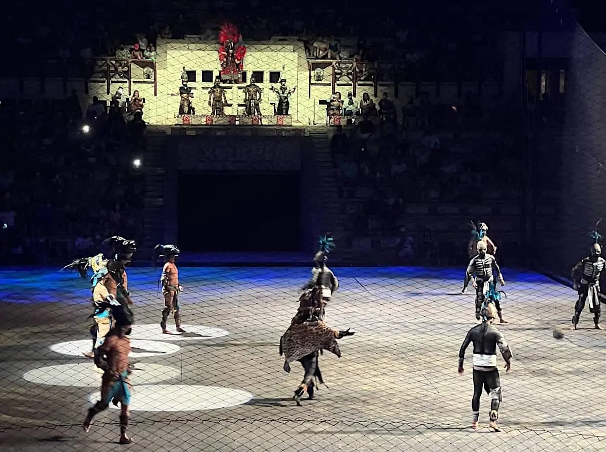 Performers recreating a Mayan ball game at Xcaret Mexico Espectacular.