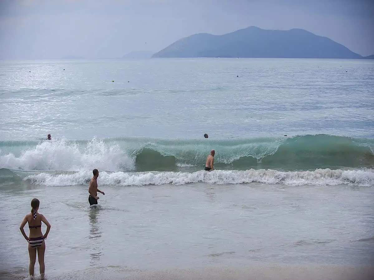 People playing in the waves in BVI.