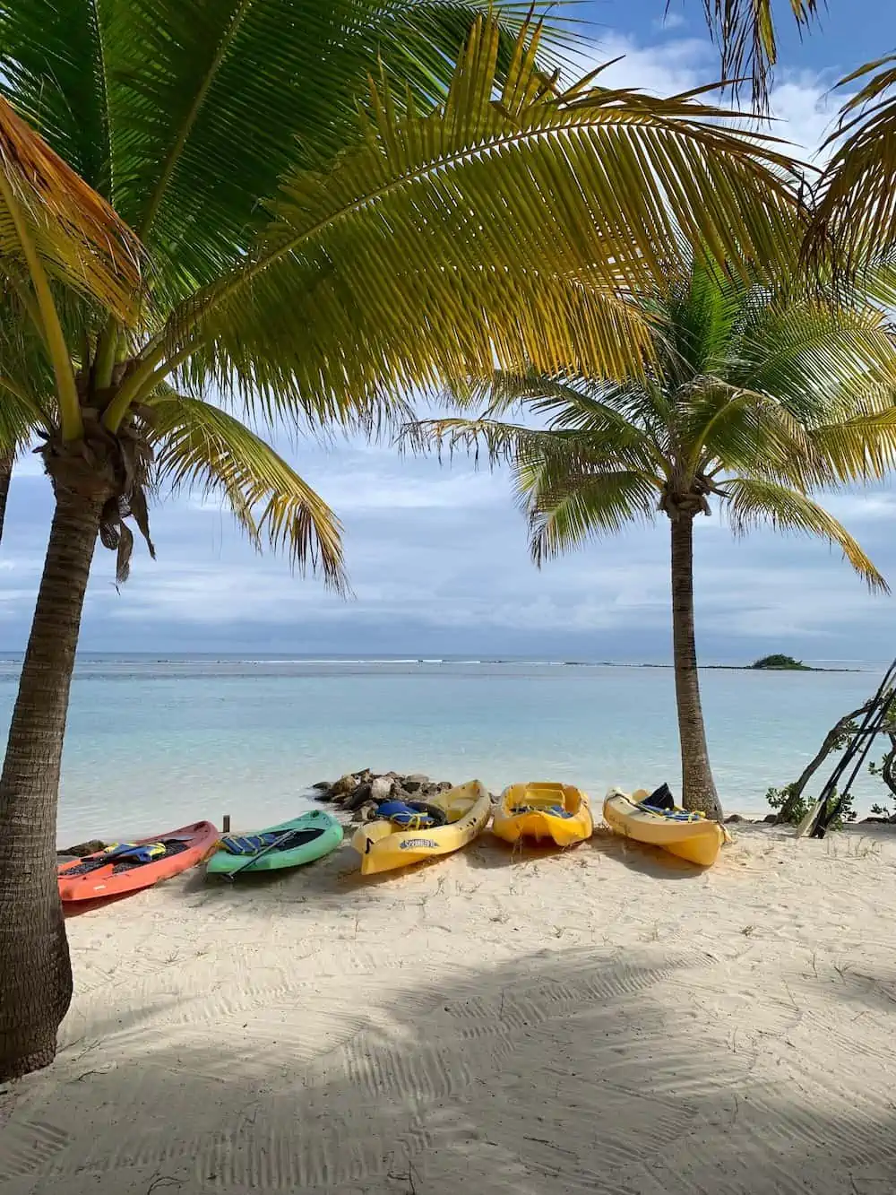Kayaks on the beach at South Water Caye.