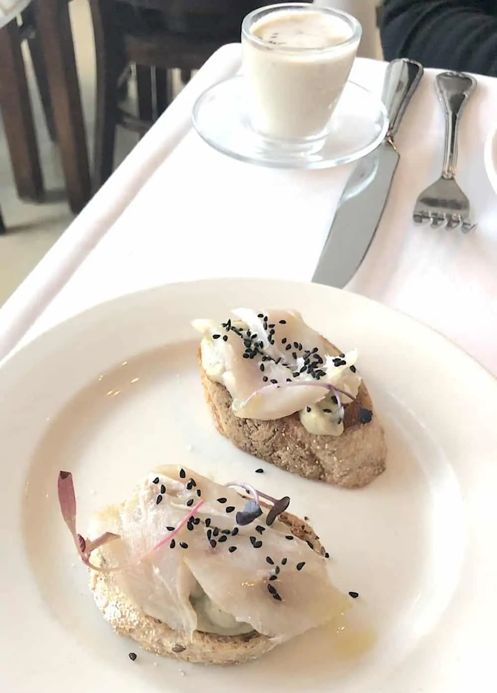 Appetizers on a white plate. 