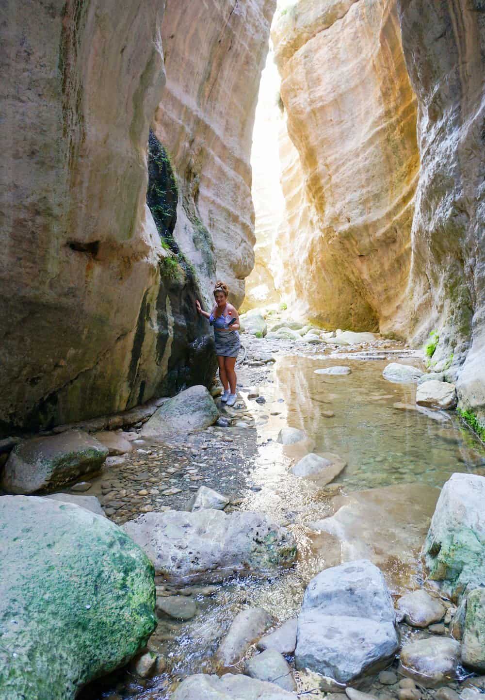 Woman hiking the Avakas Gorge.