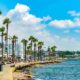 Beautiful harbour with palm trees and promenade in Paphos Crete.