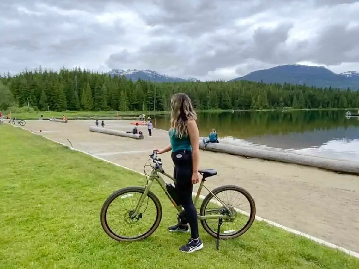 Woman on an e-bike at Lost Lake in Whistler.