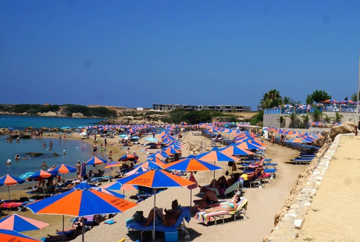 Umbrellas at Corallia Beach a sandy beach in Paphos.