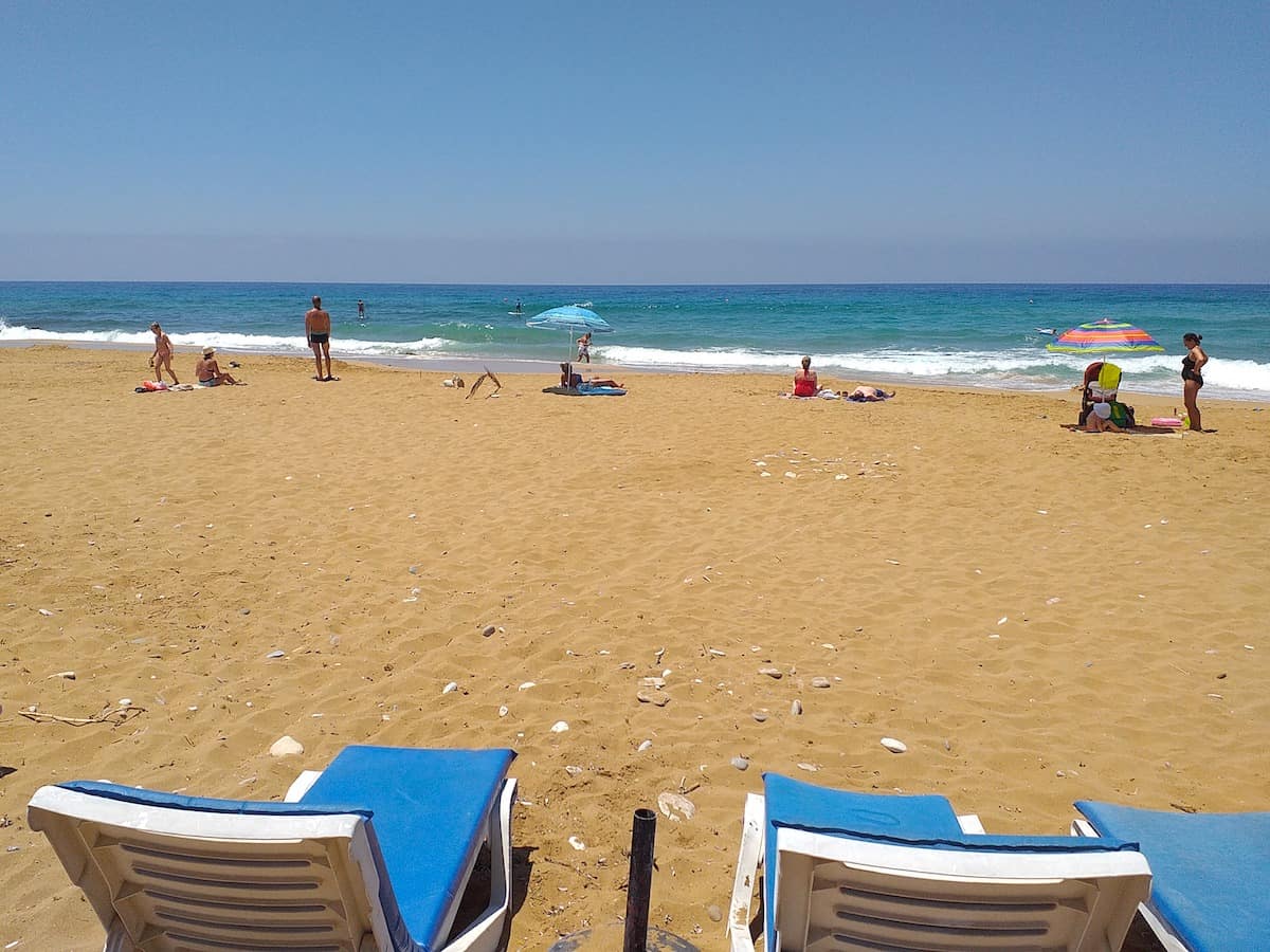 Beach chairs at Sandy Beach in Paphos Cyprus.