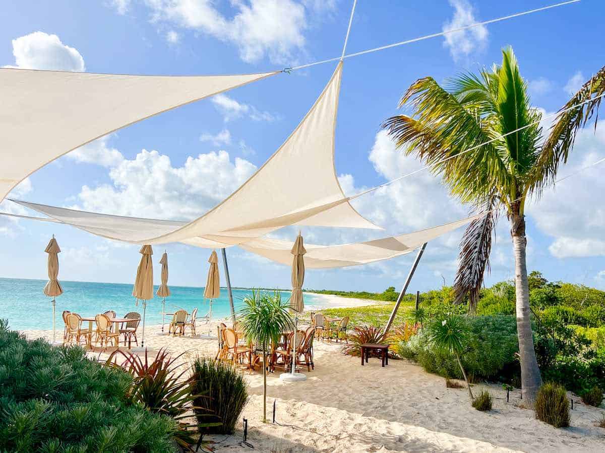 Tables outdoors at Nobu Restaurant in Barbuda.