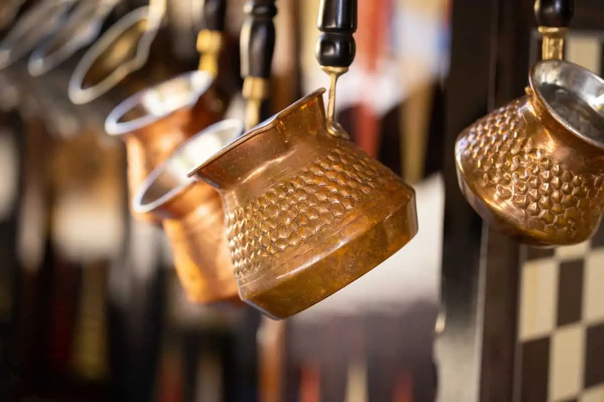 A row of copper pots for making traditional Turkish coffee. 