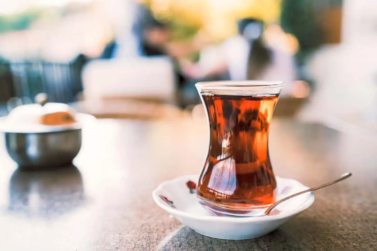 Turkish apple tea in a white saucer. Takenori Okada