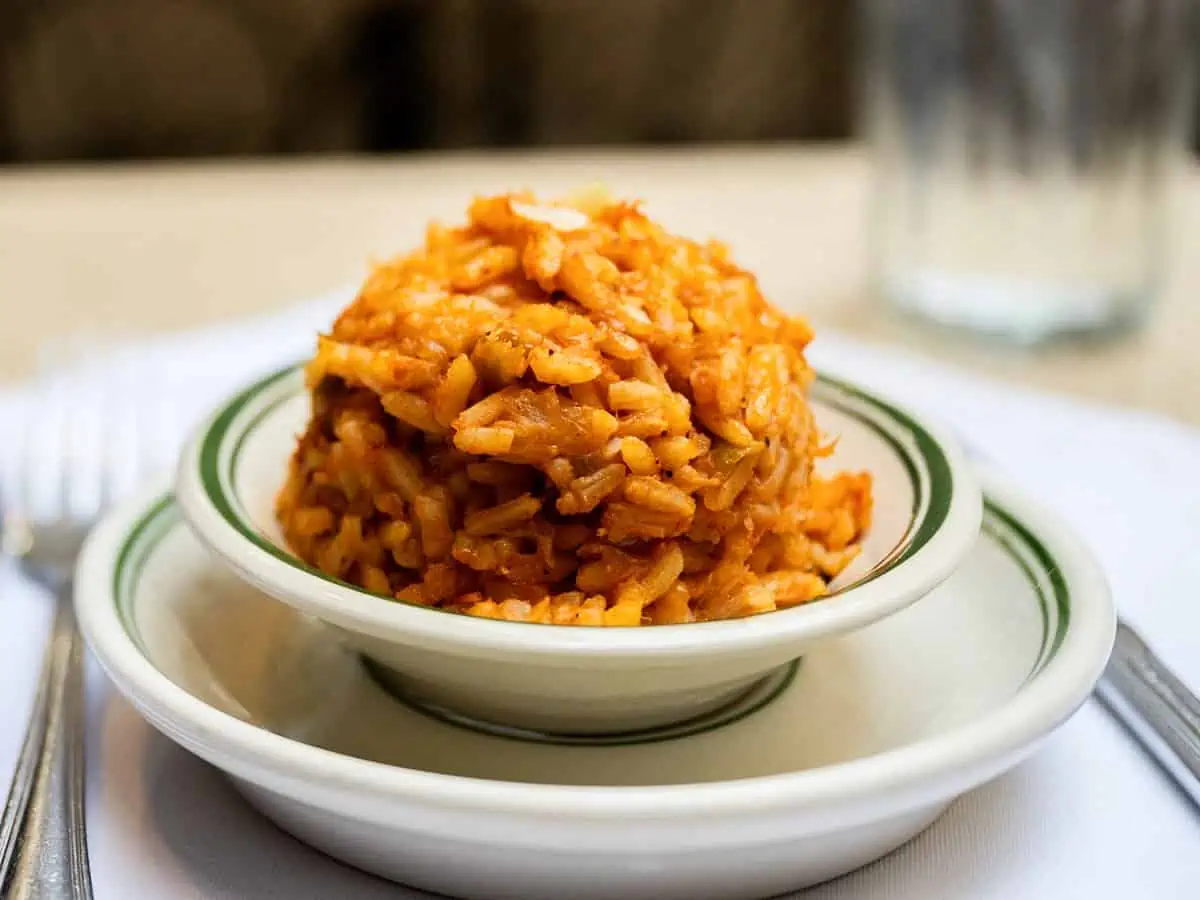 Bowl of Jambalaya on table. 