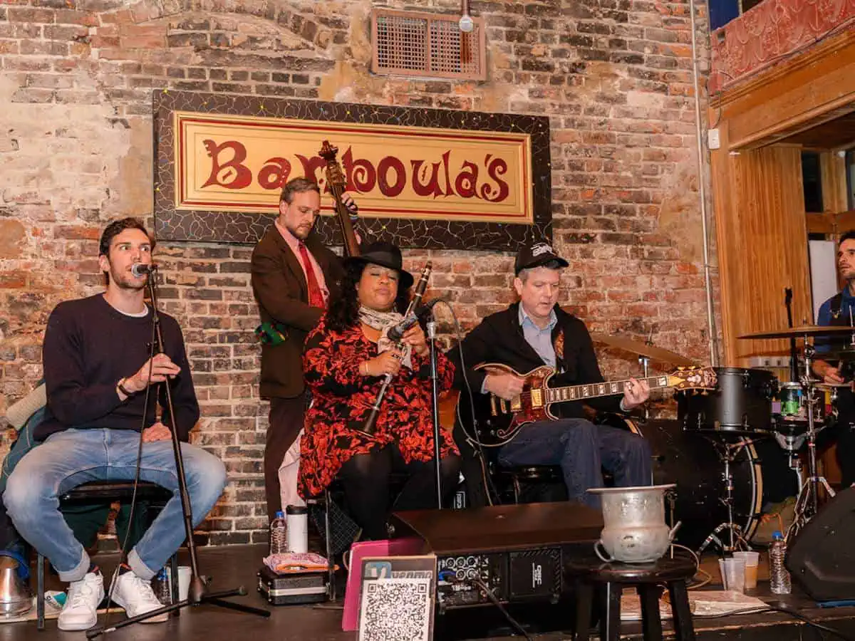 Musicians playing music in bar in New Orleans.