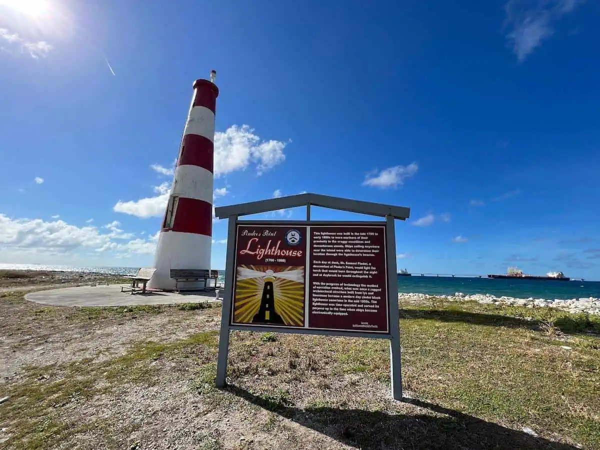 Pinders Point Lighthouse with sign. 