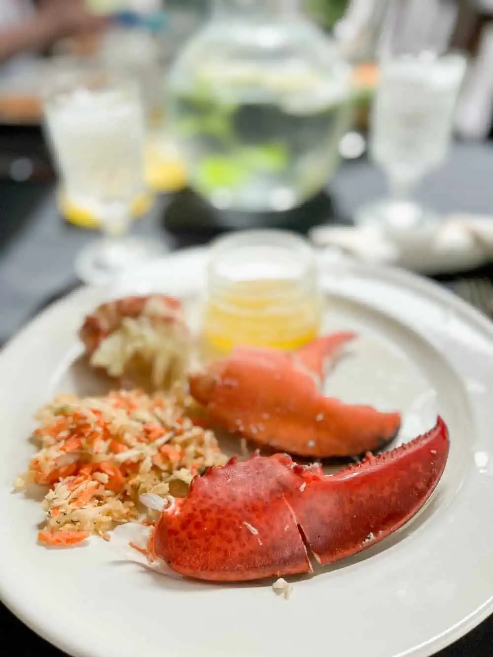 Nova Scotia lobster claws on a white plate. 