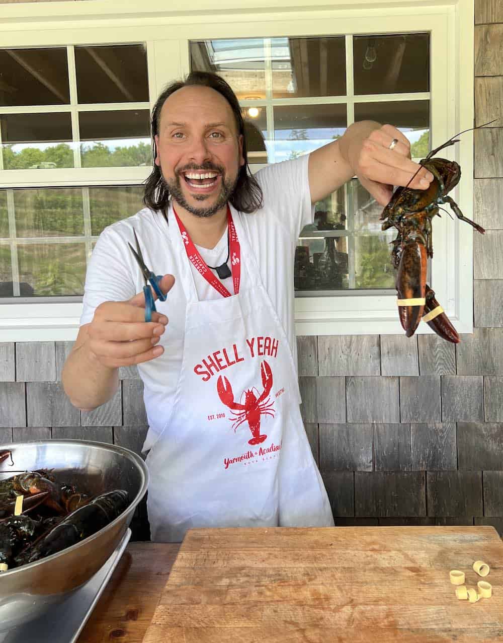 TMAC industry member Jerry Grymek at a lobster cooking class.