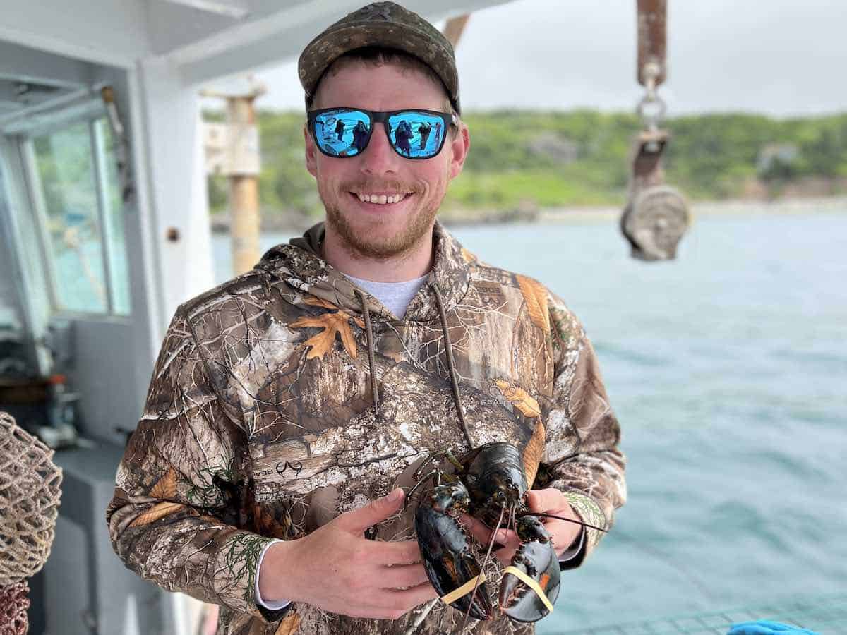 Lobster fisher Captain Kyle Redden in Whale Cove, Nova Scotia.