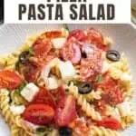Pizza pasta salad in a white bowl.