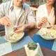 Couple enjoying oysters.