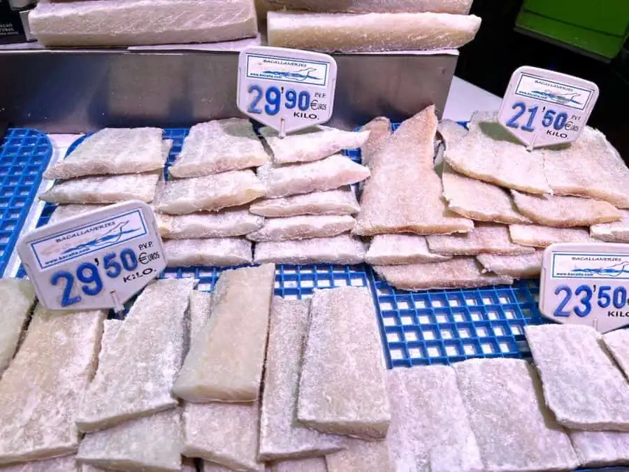 Pieces of salted cod for sale at La Boqueria market in Barcelona.