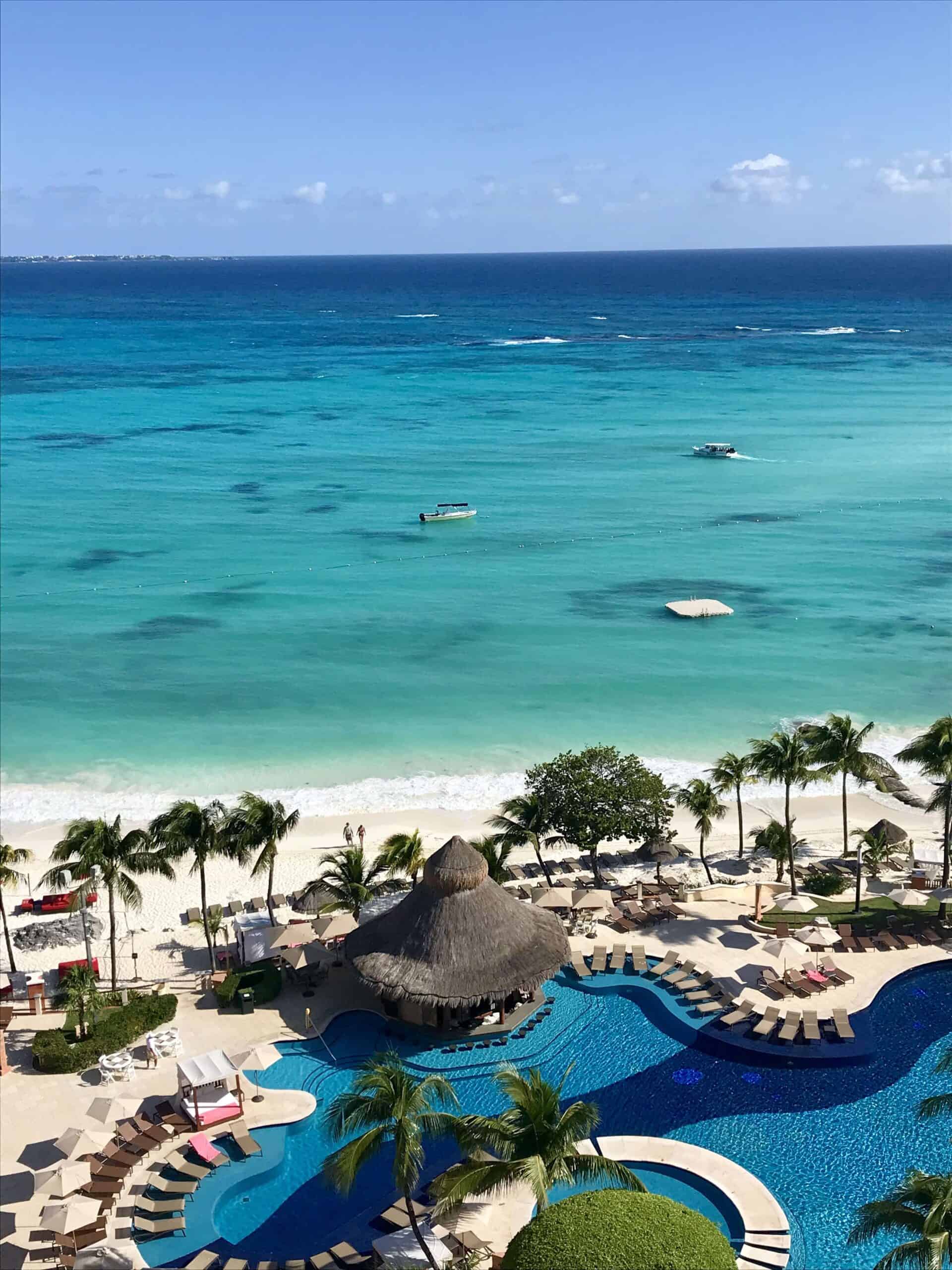View of the beach and swimming pool at Grand Fiesta Americana Coral Beach in cancun. 