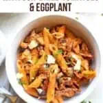 A white bowl of pasta with eggplant and sun dried tomatoes with text overlay for Pinterest.