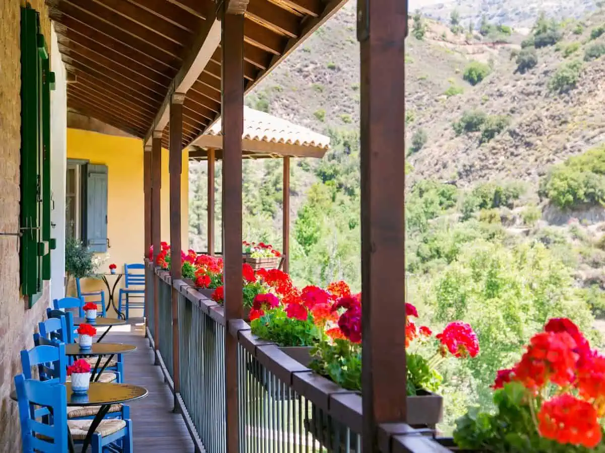 Beautiful red flowers at Casale Panayiotis a mountain village spa. 