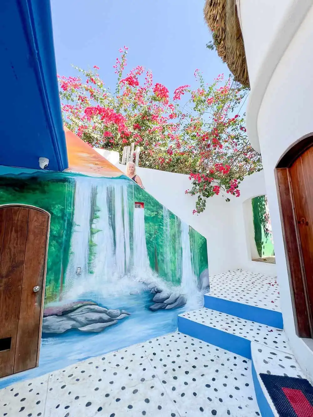 Mural of a waterfall at Beachfront Paradise Boutique Hotel at Agua Blanca. 