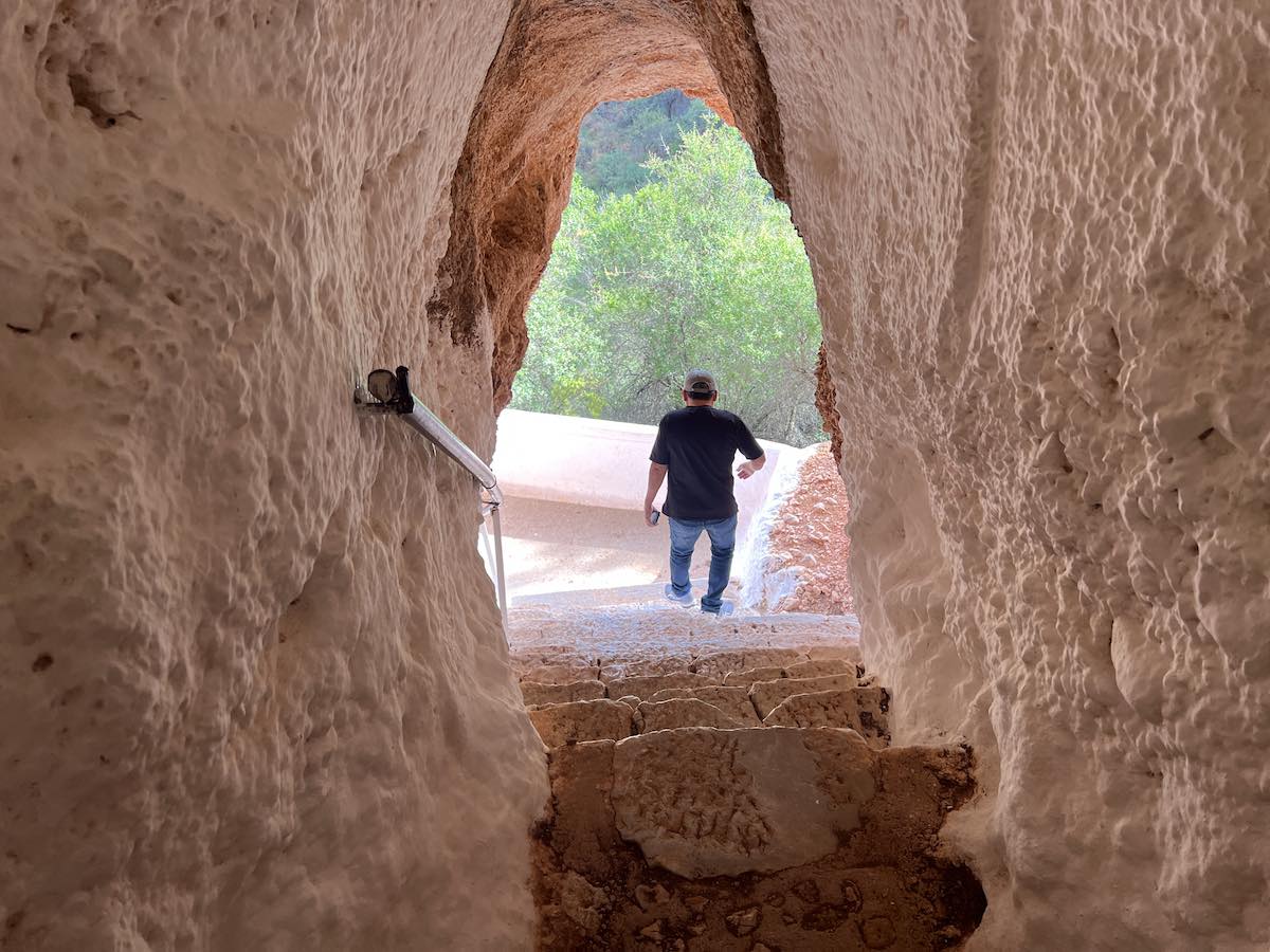 Entrance to cave church carved into cliffs at Didyma-Agios Georgios, Greece.