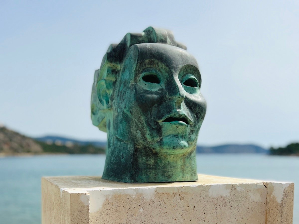 Statue on waterfront of Ermione. 