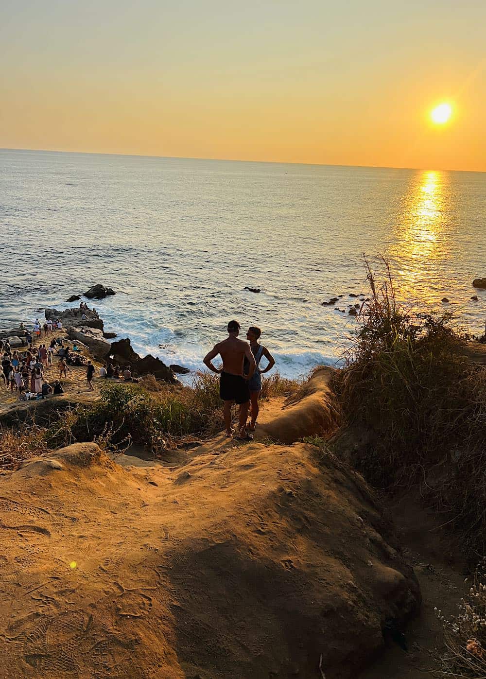 People wataching the sunset at Mirador Las Tortugas in PUerto Escondido, Oaxaca. 