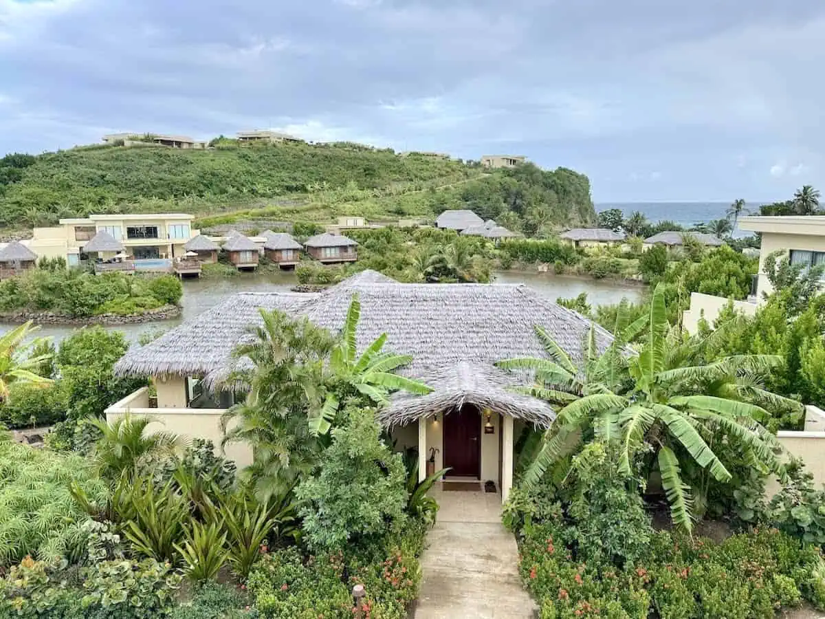 View of the lagoon, villas and pool suites at Six Senses.