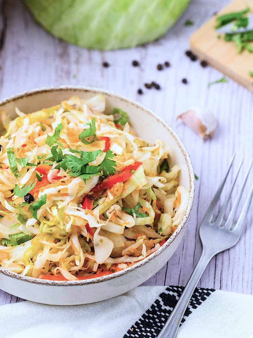 Guatemalan curtido ( cabbage slaw) in a white bowl.