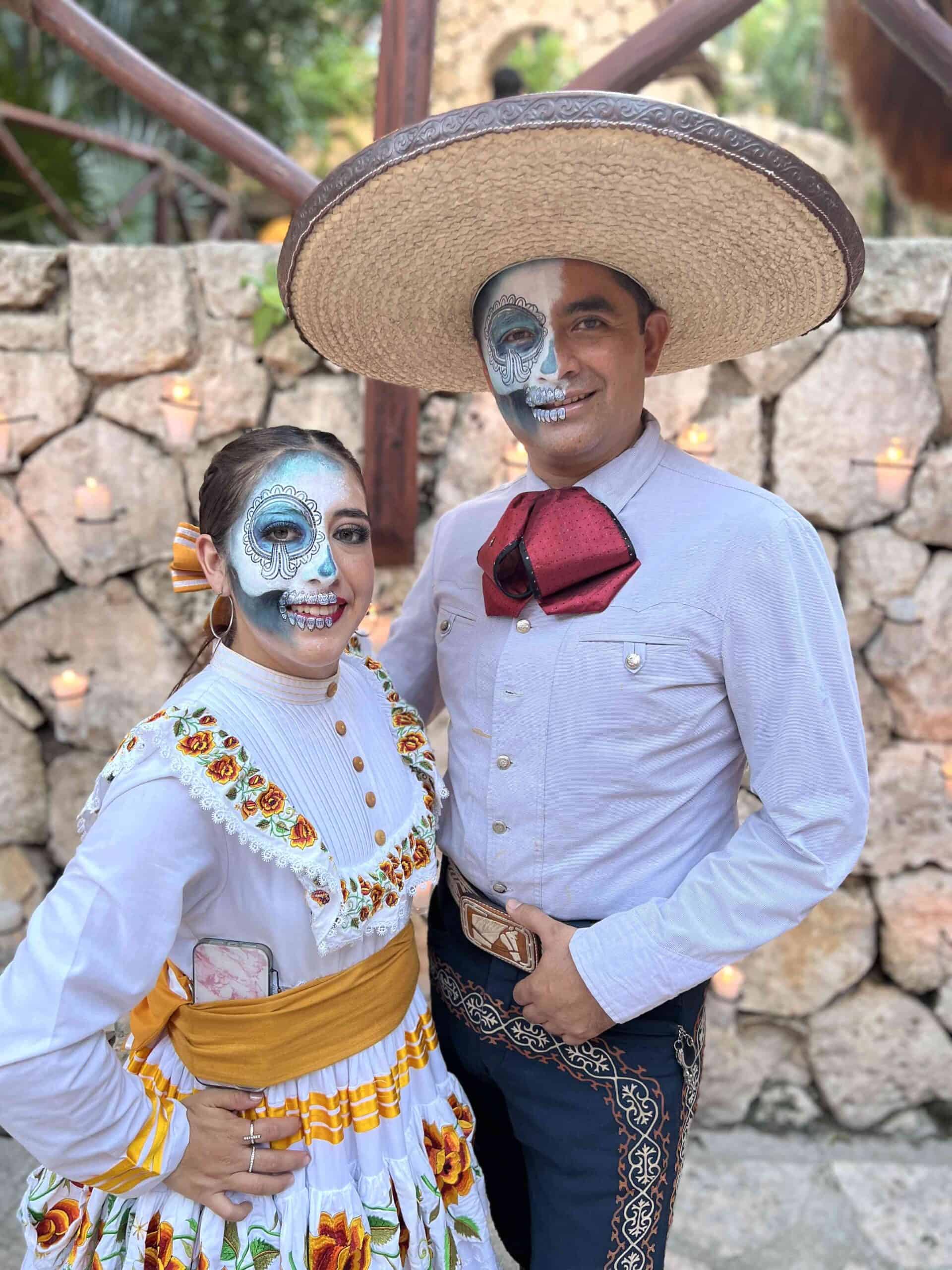 Young couple with painted faces on Day of the Dead at Xcaret Park. 