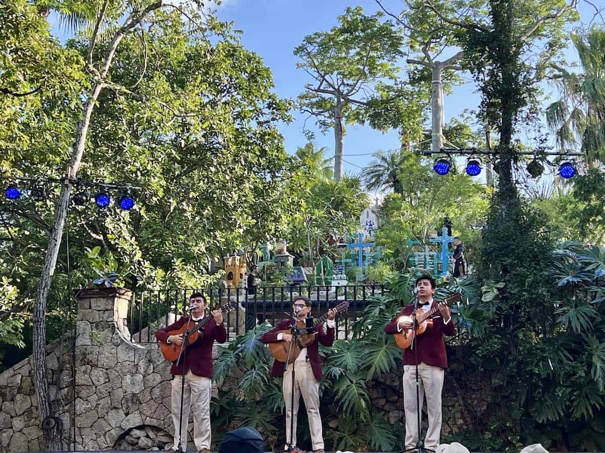 A trio of musicians playing as part of the program of Day of the Dead in Riviera Maya. 