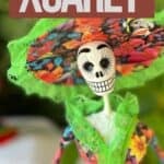 Pinterest image of a catrina at Xcaret Festival of Life & Death Traditions