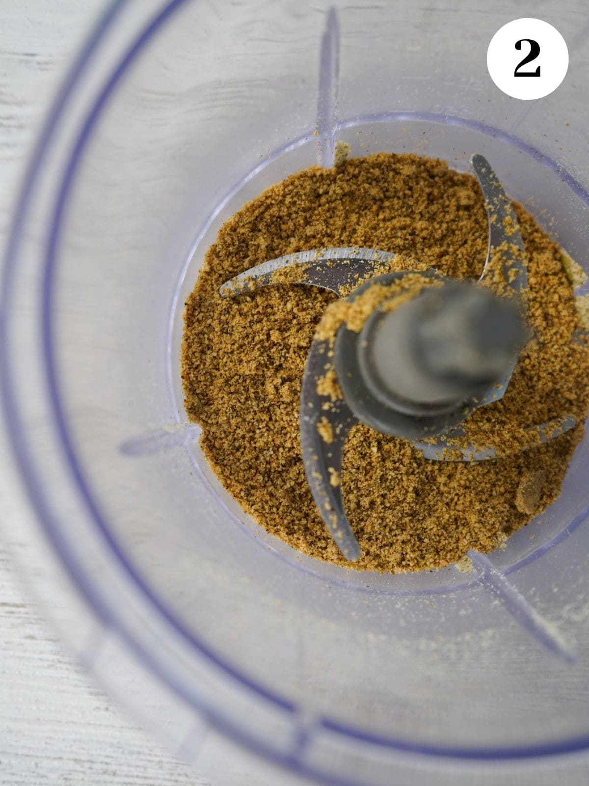 Pumpkin seeds ground in a food processor. 